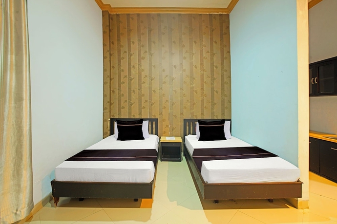 Imagen de la habitación del Hotel O near Universitas Palangka Raya. Foto 7