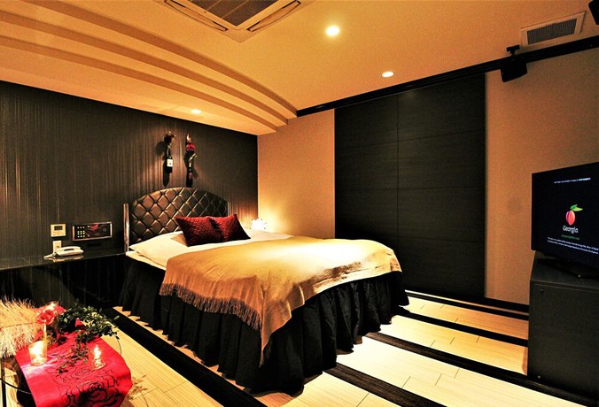 Imagen de la habitación del Hotel O2 - Adults Only. Foto 11