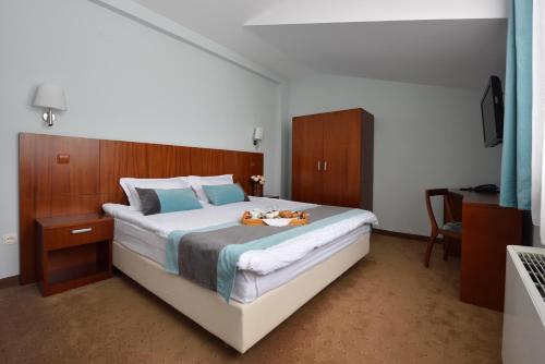 Imagen de la habitación del Hotel O3Zone. Foto 7