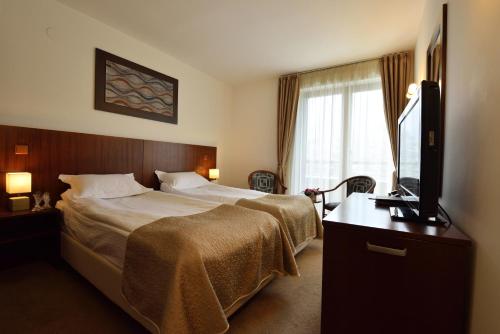 Imagen de la habitación del Hotel O3Zone. Foto 8