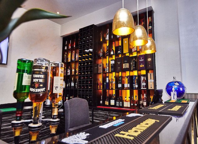 Imagen de la habitación del Hotel OAK HAVENS HOTEL. Foto 10