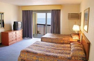 Imagen de la habitación del Hotel OCEAN SANDS RESORT. Foto 2