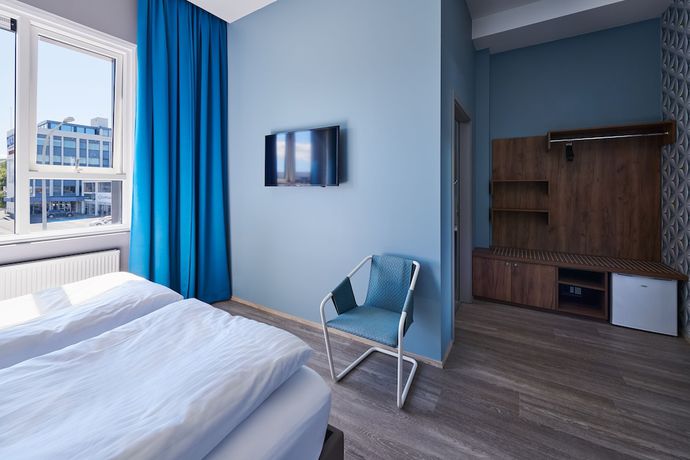 Imagen de la habitación del Hotel ODDSSON. Foto 6