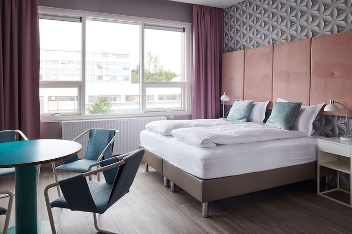 Imagen de la habitación del Hotel ODDSSON. Foto 13