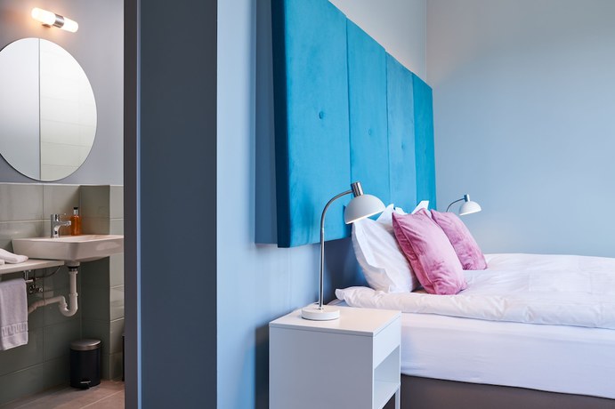 Imagen de la habitación del Hotel ODDSSON. Foto 16