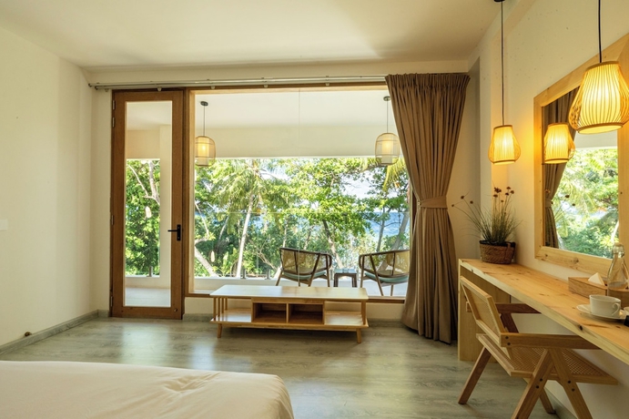 Imagen de la habitación del Hotel ODI Beachfront. Foto 5