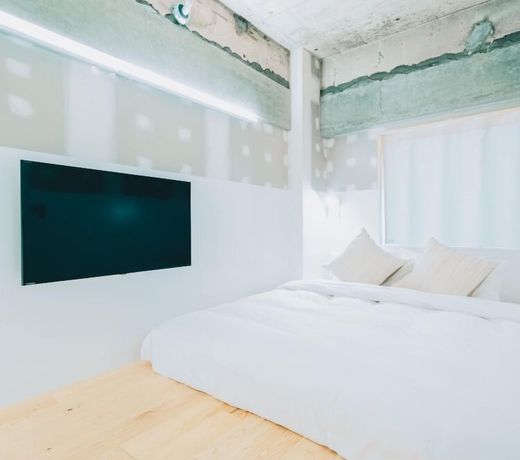 Imagen de la habitación del Hotel OF HOTEL. Foto 15