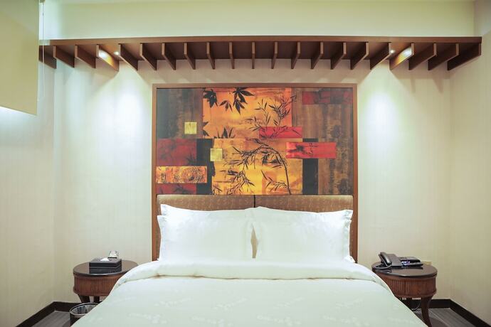Imagen de la habitación del Hotel OHYA Chain Boutique Motel-Xinying. Foto 11