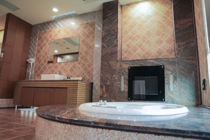 Imagen de la habitación del Hotel OHYA Chain Boutique Motel-Xinying. Foto 17