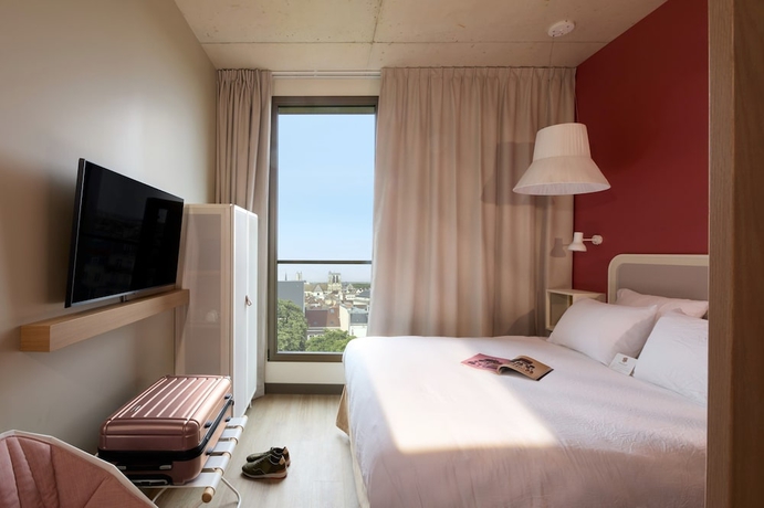 Imagen de la habitación del Hotel OKKOs Troyes Centre. Foto 2