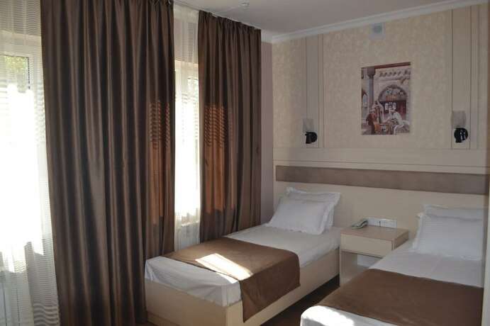 Imagen de la habitación del Hotel OLDKHIVA. Foto 20