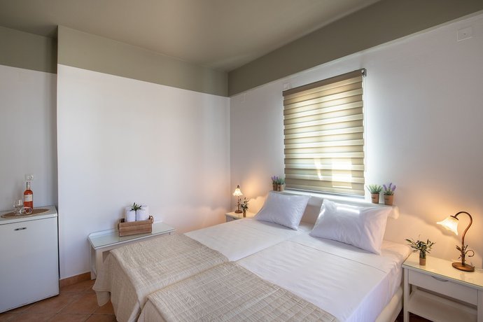 Imagen de la habitación del Hotel OLIVAS ROOMS. Foto 9