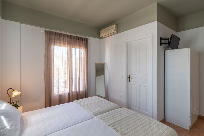 Imagen de la habitación del Hotel OLIVAS ROOMS. Foto 10