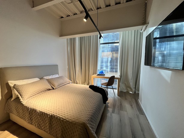 Imagen de la habitación del Hotel OLSON Real Acueducto and Suites. Foto 8