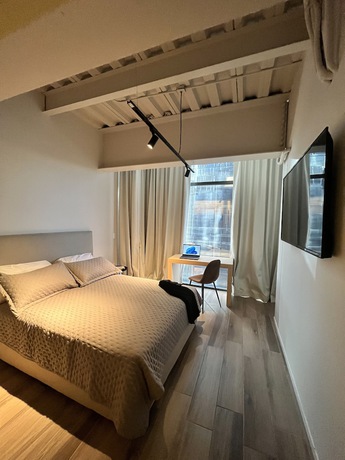 Imagen de la habitación del Hotel OLSON Real Acueducto and Suites. Foto 12