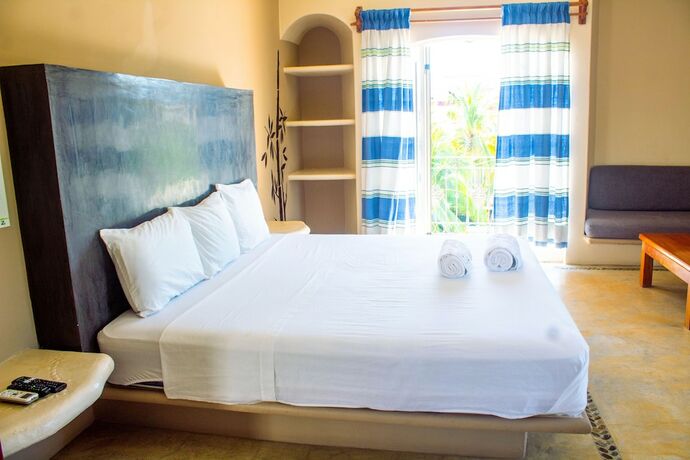 Imagen de la habitación del Hotel OM Huatulco. Foto 18