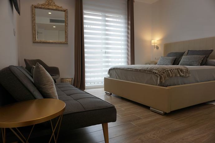 Imagen de la habitación del Hotel OMA. Foto 8