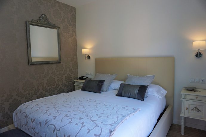Imagen de la habitación del Hotel OMA. Foto 9