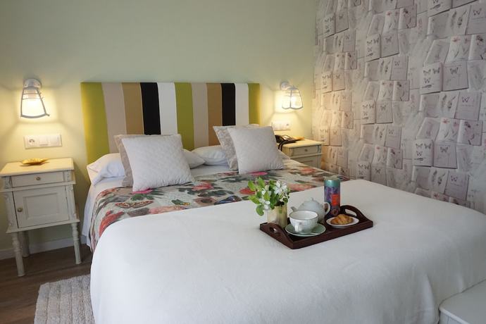 Imagen de la habitación del Hotel OMA. Foto 10