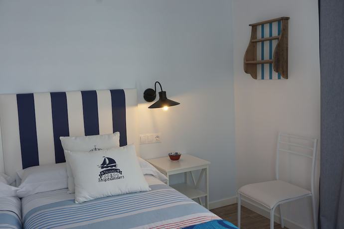 Imagen de la habitación del Hotel OMA. Foto 12
