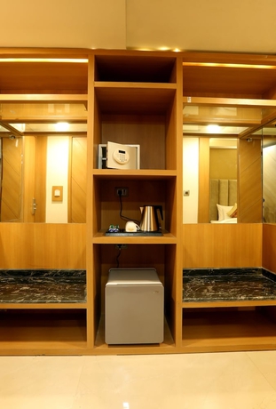Imagen de la habitación del Hotel OMEGA, Gurugram. Foto 11