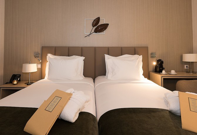 Imagen de la habitación del Hotel OMID Boutique. Foto 12