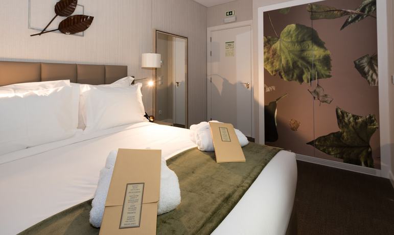 Imagen de la habitación del Hotel OMID Boutique. Foto 13