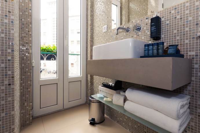 Imagen de la habitación del Hotel OMID Boutique. Foto 15