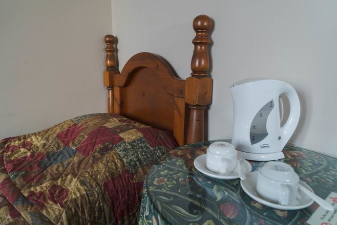 Imagen de la habitación del Hotel O\'Malley\'s. Foto 2