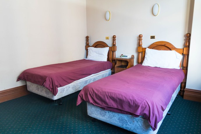 Imagen de la habitación del Hotel O\'Malley\'s. Foto 10