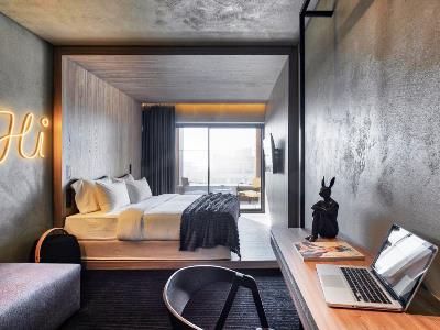 Imagen de la habitación del Hotel ONOMA. Foto 6