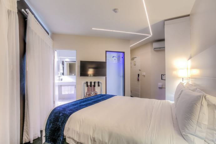 Imagen de la habitación del Hotel ONOMO Hotel Johannesburg Sandton. Foto 2