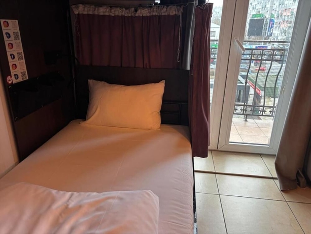 Imagen de la habitación del Hotel ONRest Hostel. Foto 6