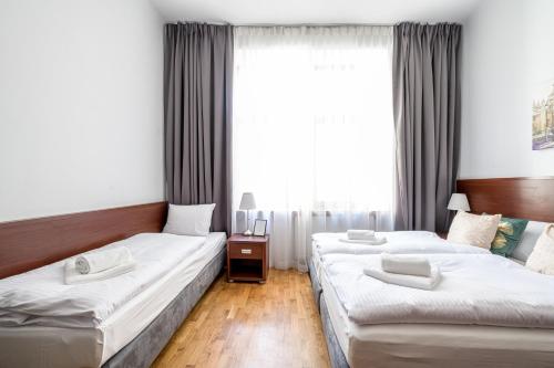 Imagen de la habitación del Hotel ON/SET APARTHOTEL. Foto 16