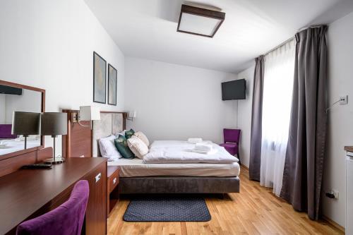 Imagen de la habitación del Hotel ON/SET APARTHOTEL. Foto 17