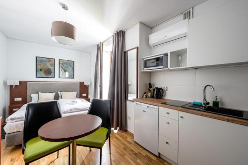 Imagen de la habitación del Hotel ON/SET APARTHOTEL. Foto 18