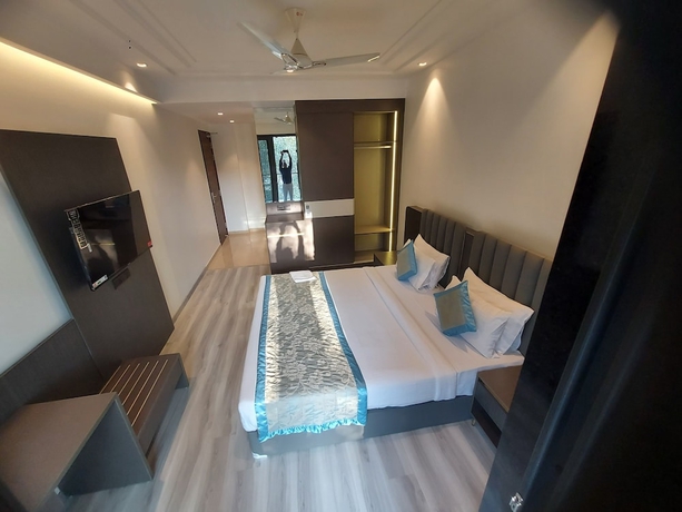 Imagen de la habitación del Hotel OPO Iffco Chowk. Foto 3
