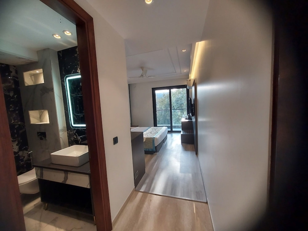 Imagen de la habitación del Hotel OPO Iffco Chowk. Foto 5