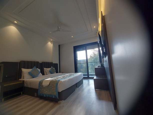 Imagen de la habitación del Hotel OPO Iffco Chowk. Foto 7