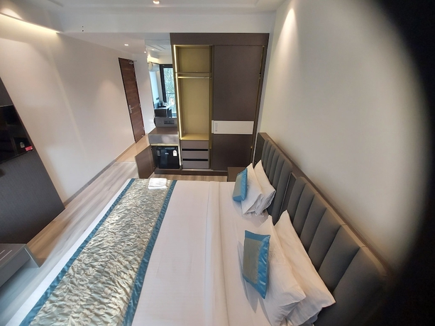Imagen de la habitación del Hotel OPO Iffco Chowk. Foto 12