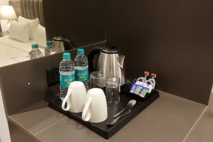 Imagen de la habitación del Hotel OPO Iffco Chowk. Foto 14