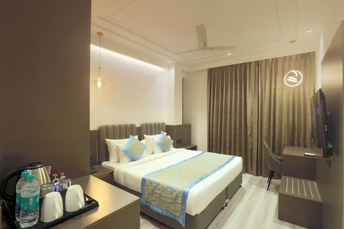 Imagen de la habitación del Hotel OPO Iffco Chowk. Foto 15