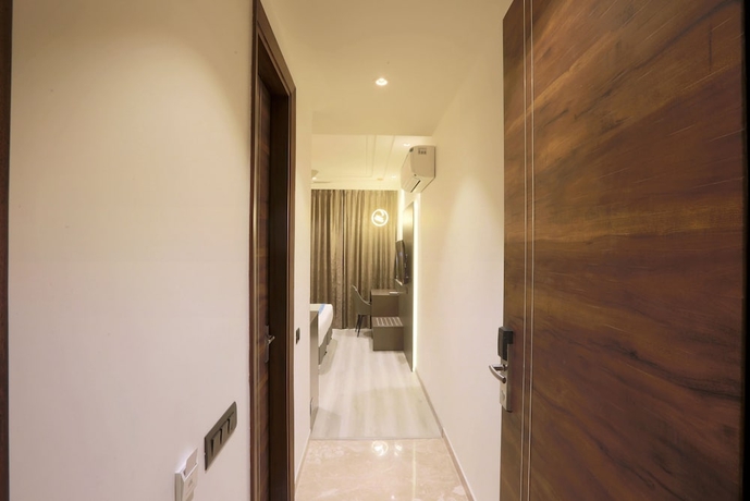 Imagen de la habitación del Hotel OPO Iffco Chowk. Foto 16