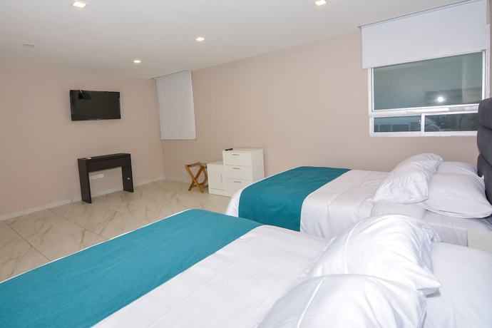 Imagen de la habitación del Hotel OR Suites. Foto 3