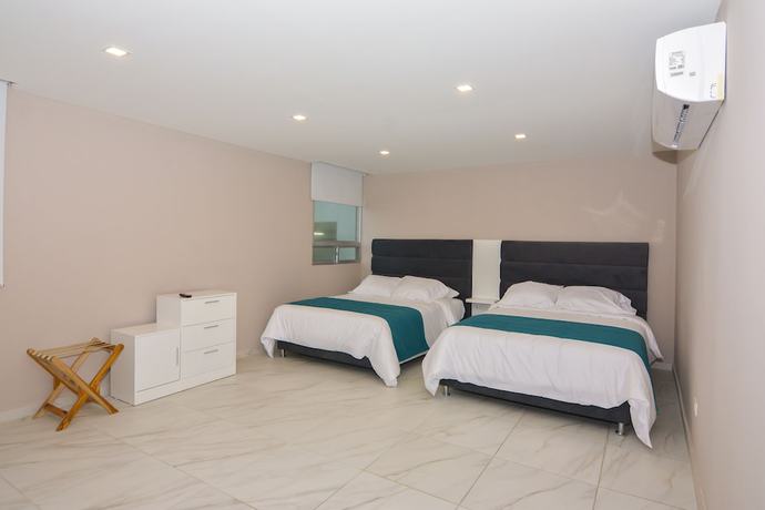 Imagen de la habitación del Hotel OR Suites. Foto 4