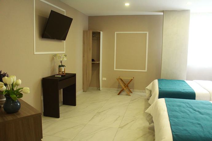 Imagen de la habitación del Hotel OR Suites. Foto 7