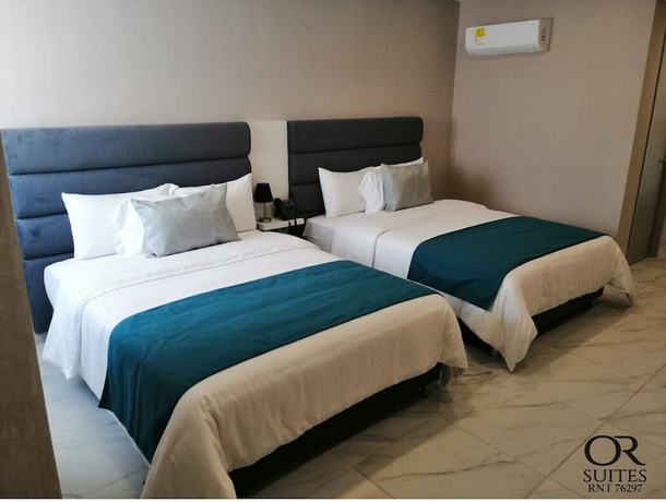 Imagen de la habitación del Hotel OR Suites. Foto 9