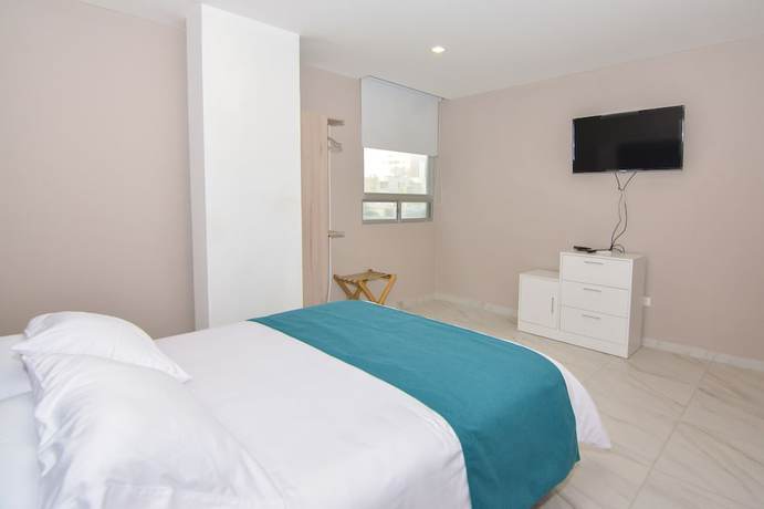 Imagen de la habitación del Hotel OR Suites. Foto 10