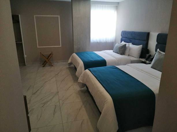 Imagen de la habitación del Hotel OR Suites. Foto 11