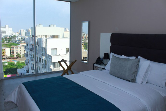 Imagen de la habitación del Hotel OR Suites. Foto 14